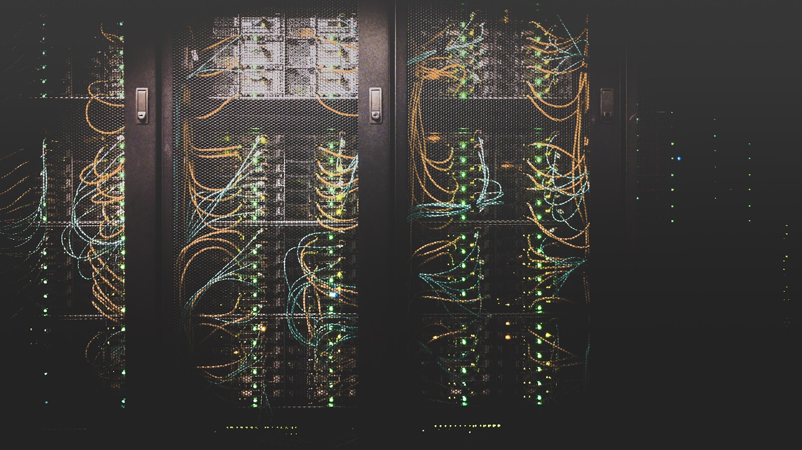 Server racks with status indicators monitored around the clock by the TigerGate SOC